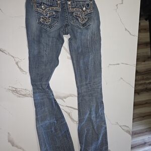Rock Revival Blue Boot Cut Jeans with Embellished Pockets